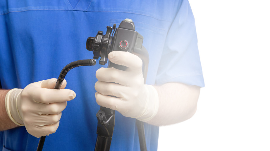 doctor holding endoscope